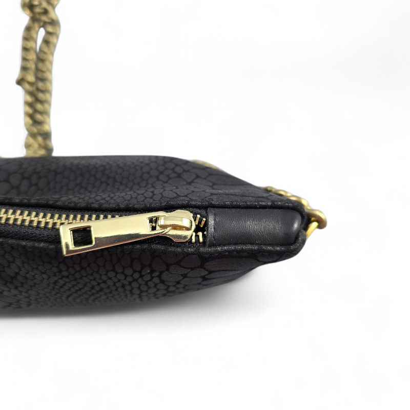 POCHETTE IN SIMILPELLE E NOTA MUSICALE RICAMATA